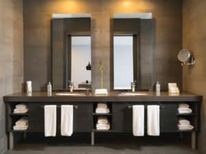 double mirrors over dark colored vanity