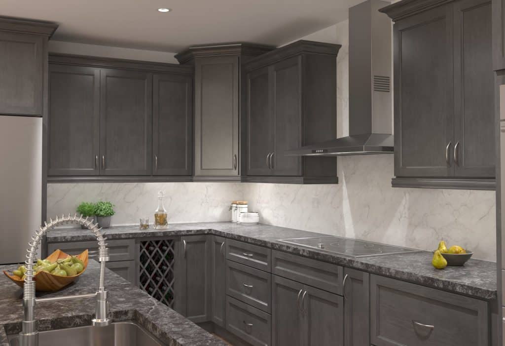 grey kitchen wall with gold cabinet